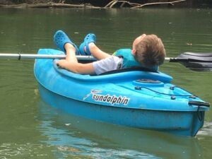 A boy kayaking in Charleston, West Virginia. 
